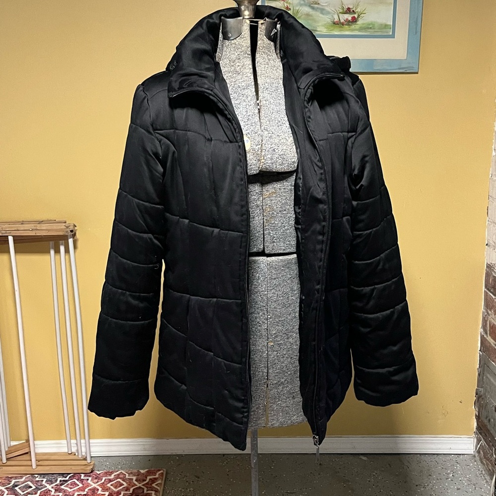 Ladies large black winter coat. Roomie. Good condition. Perfect for emo teen.